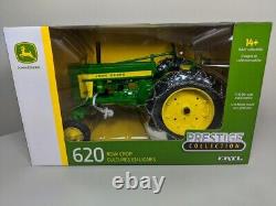 116 John Deere 620 Tractor with Wide Front and Chains LP64437