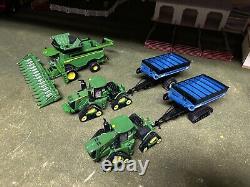 1/64 Ertl John Deere Combine, 2 John Deere Track Tractors & 2 Kinze Grain Carts