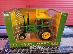 Ertl John Deere 4320 1/16 Diecast Farm Tractor Replica Collectible