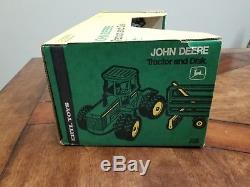 Ertl John Deere 8640 four wheel drive tractor and disk set. New in box. NIB #599
