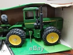 Ertl John Deere 8650 four wheel drive tractor and disk set. New in box. NIB