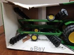 Ertl John Deere 8650 four wheel drive tractor and disk set. New in box. NIB