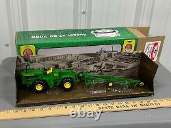 John Deere 8010 4WD Tractor w Plow 2009 Rantoul, IL Show Tractor 132 Ertl RARE