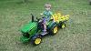 Little Boy Loves John Deere Tractors