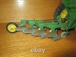 Vintage JOHN DEERE Toy Tractor & Plow with Tractor Box some condition issues