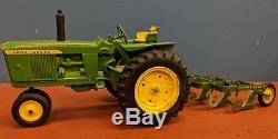 Vtg Ertl John Deere Die Cast Toy Tractor With Eska Pressed Steel 4 Bottom Plow