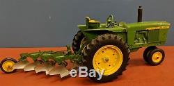 Vtg Ertl John Deere Die Cast Toy Tractor With Eska Pressed Steel 4 Bottom Plow